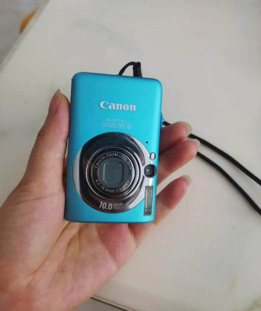 Canon Ixus 95 is ( RARE colours) pink!green!blue